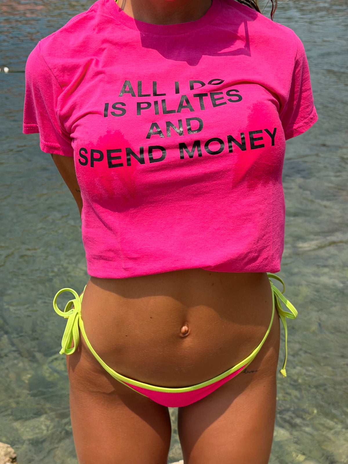 "ALL I DO IS PILATES AND SPEND MONEY" pink tee