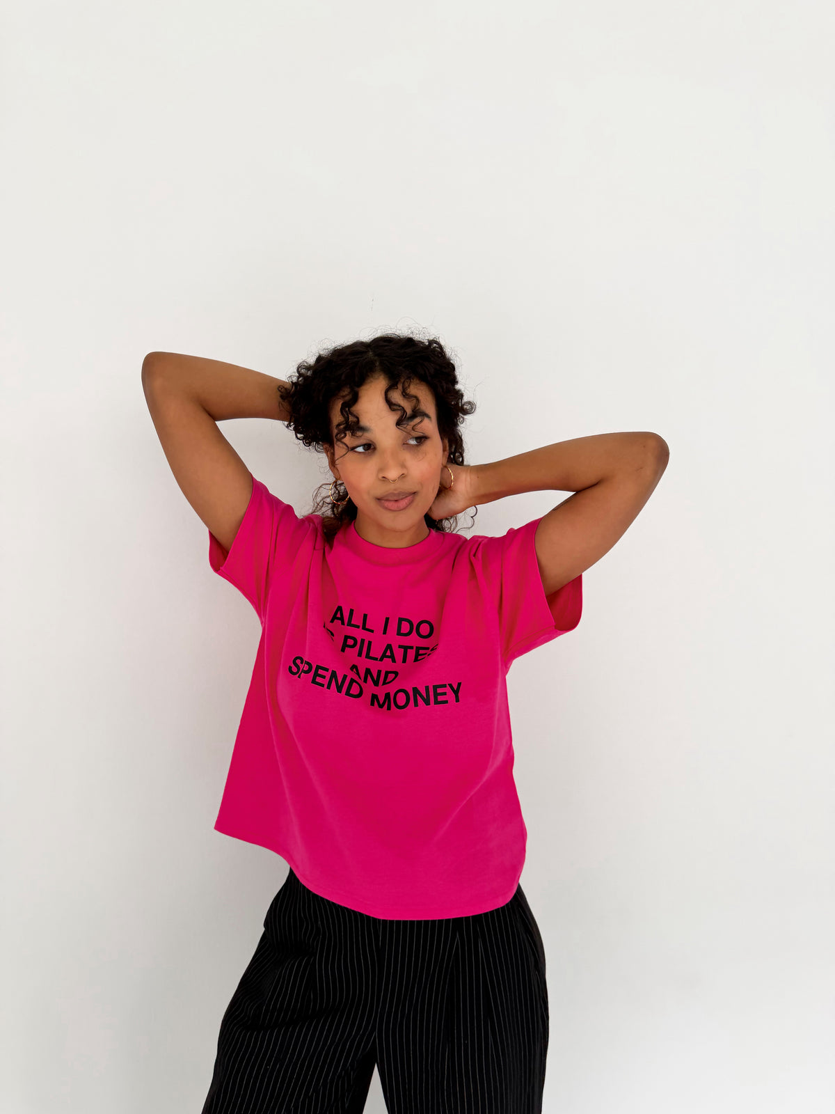 "ALL I DO IS PILATES AND SPEND MONEY" pink tee